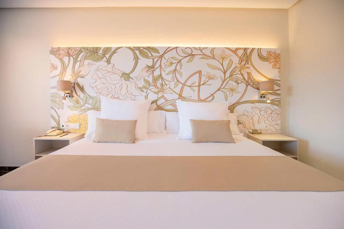 Cama o camas de una habitación en Hotel Servigroup Montíboli