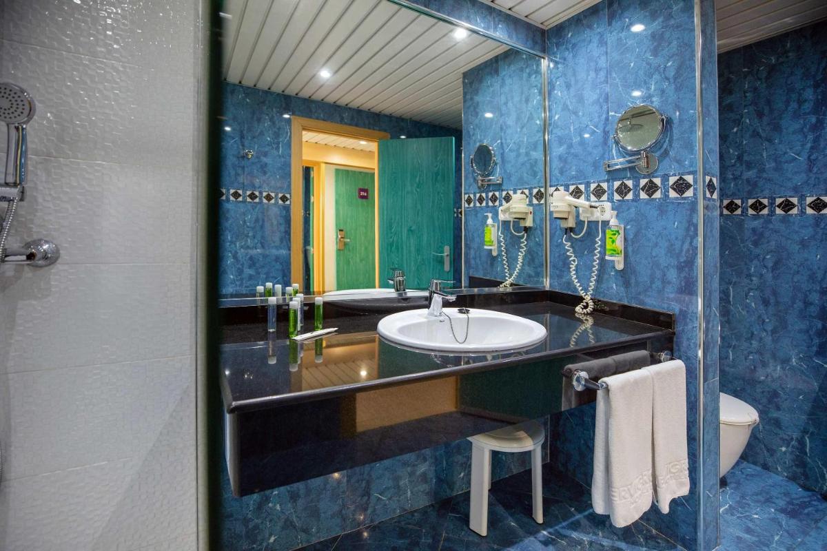 Un baño de Hotel Servigroup Galua