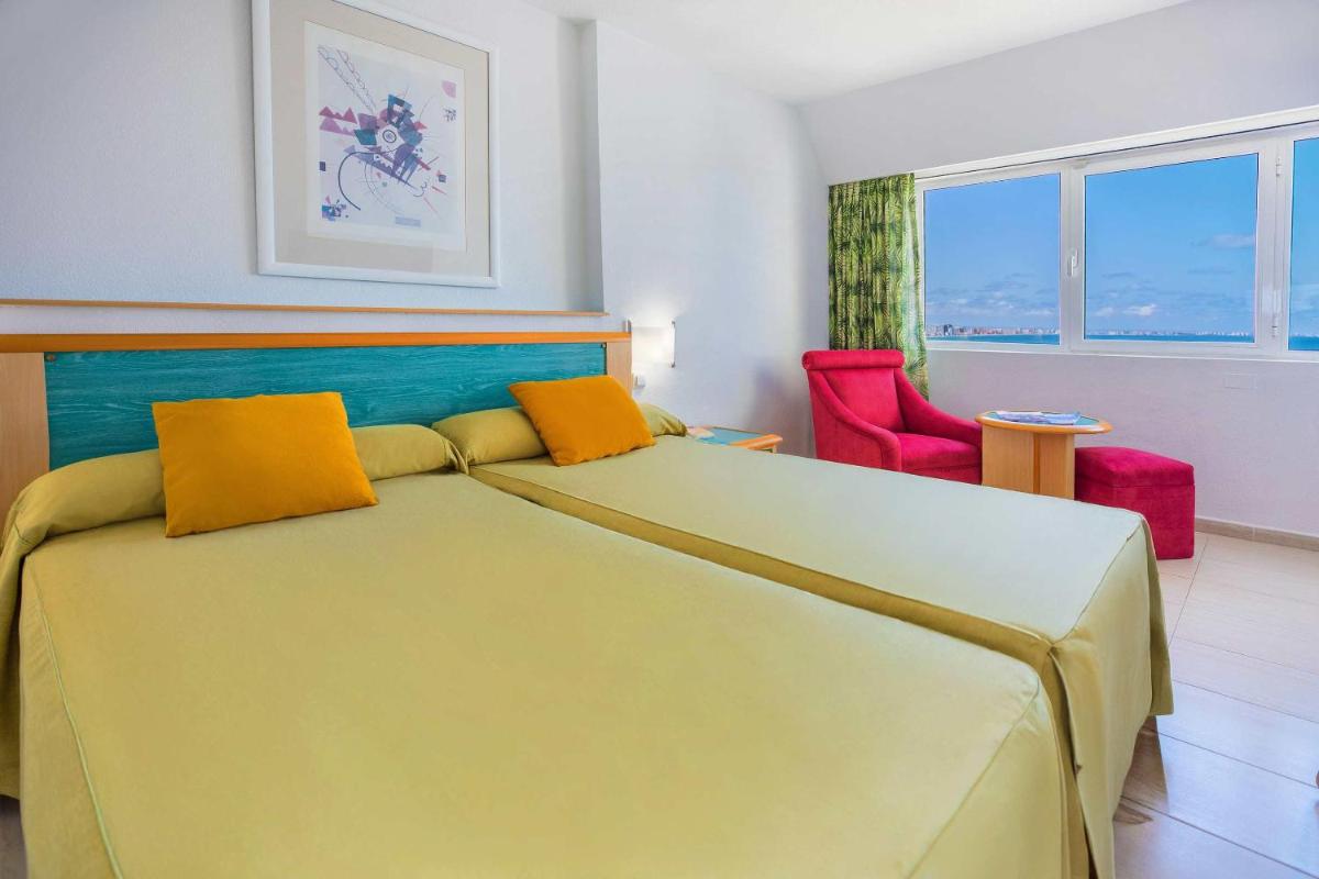 Cama o camas de una habitación en Hotel Servigroup Galua