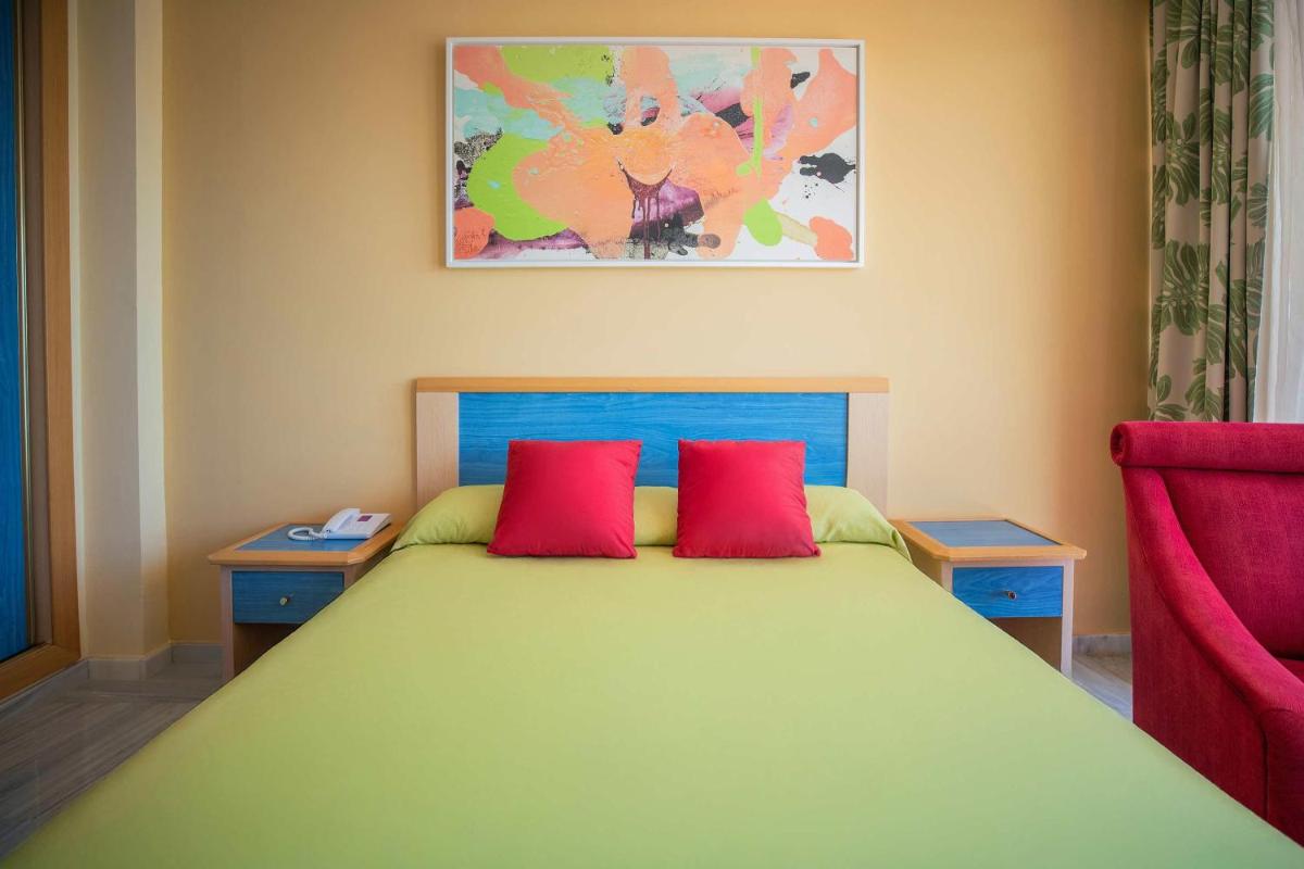 Cama o camas de una habitación en Hotel Servigroup Galua