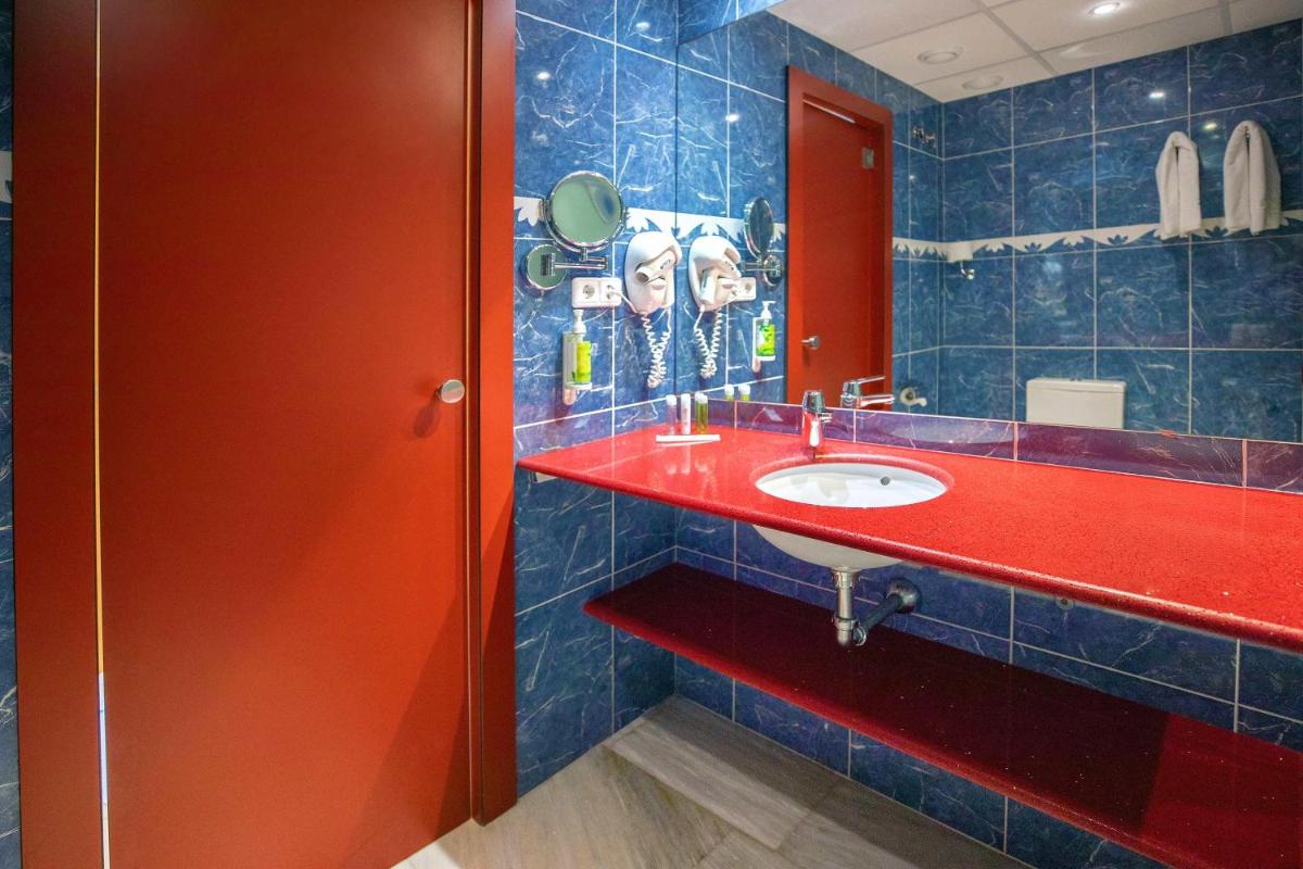 Un baño de Hotel Servigroup Galua