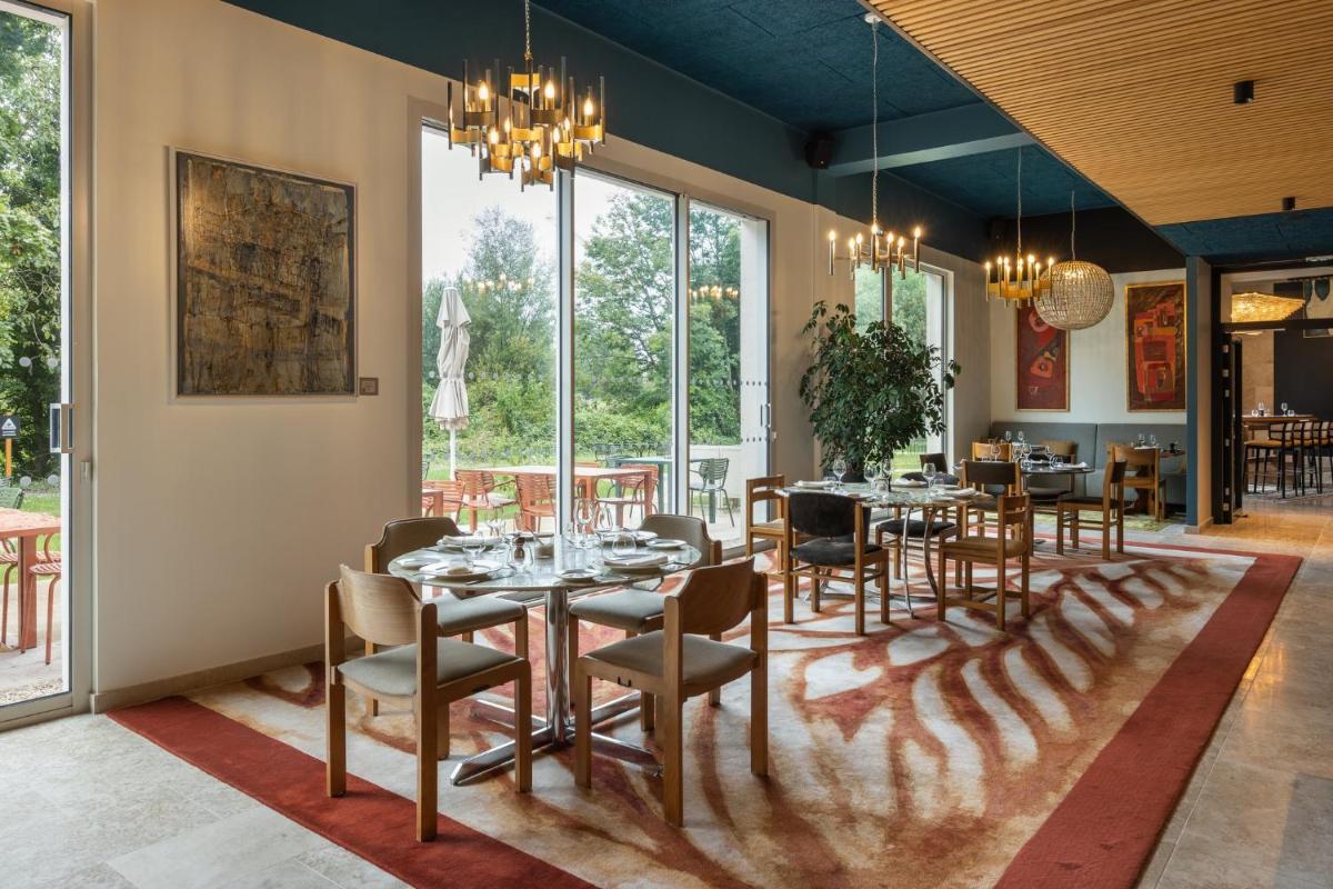 Coin salon dans l'établissement voco Beaune , Cité des Vins by IHG
