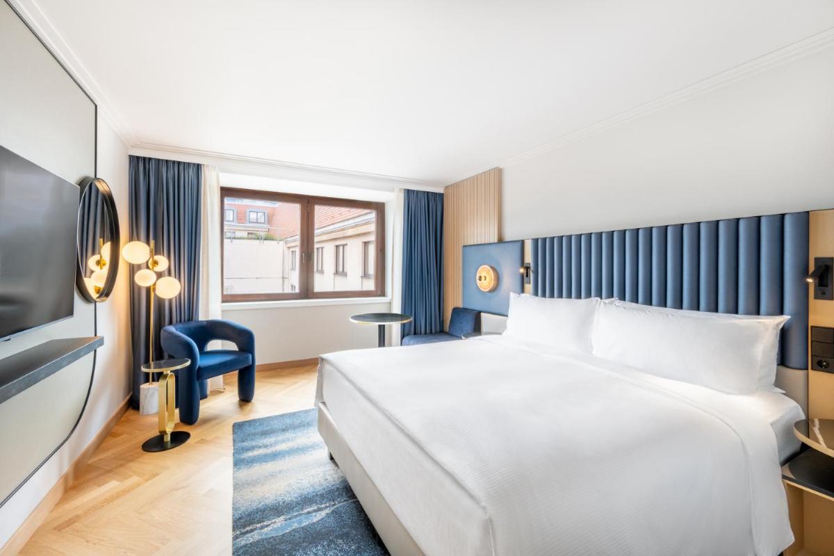 Ein Bett oder Betten in einem Zimmer der Unterkunft Hilton Berlin