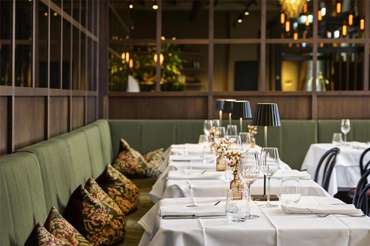 Ein Restaurant oder anderes Speiselokal in der Unterkunft Telegraphenamt