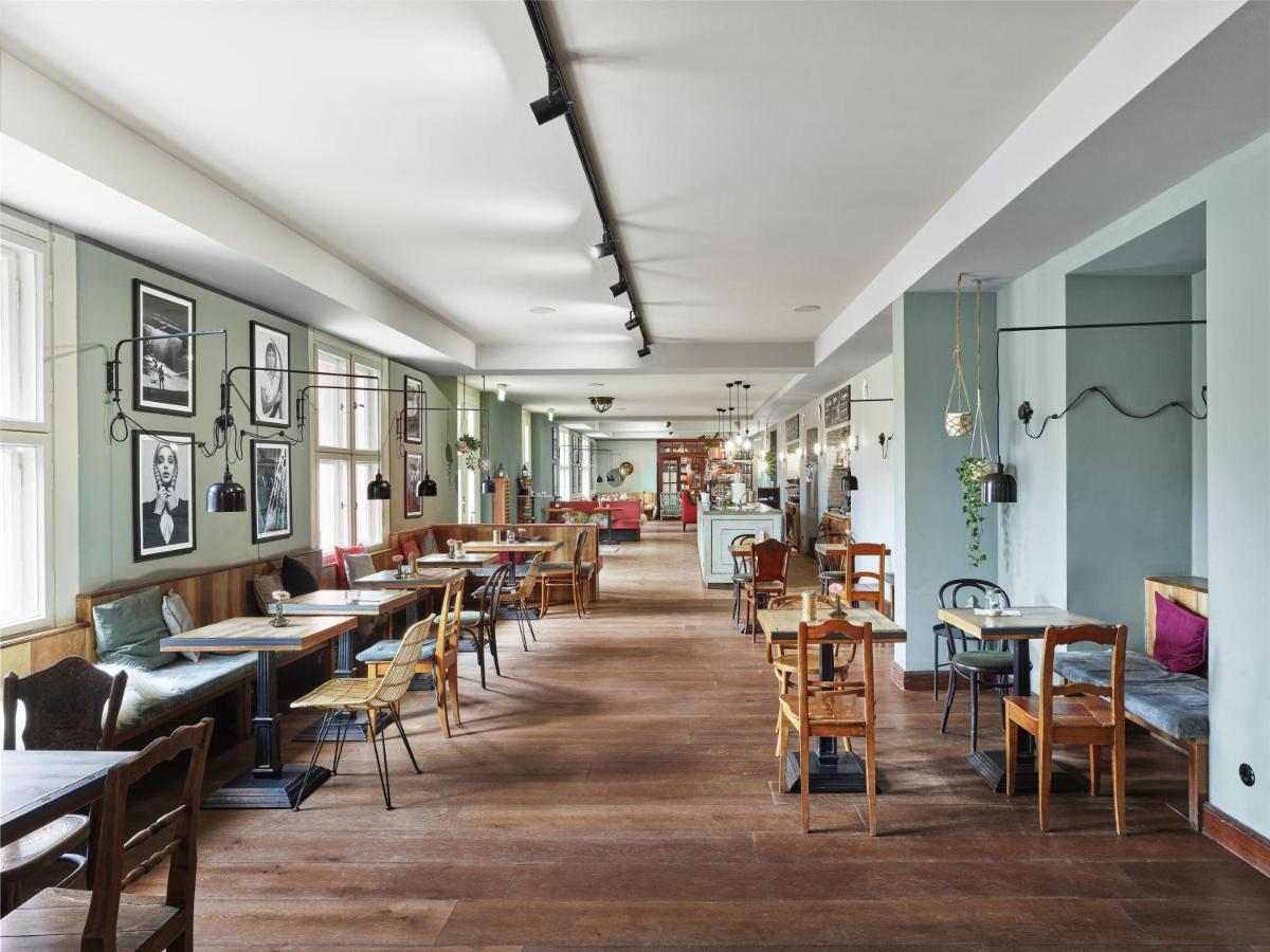 Ein Restaurant oder anderes Speiselokal in der Unterkunft Telegraphenamt