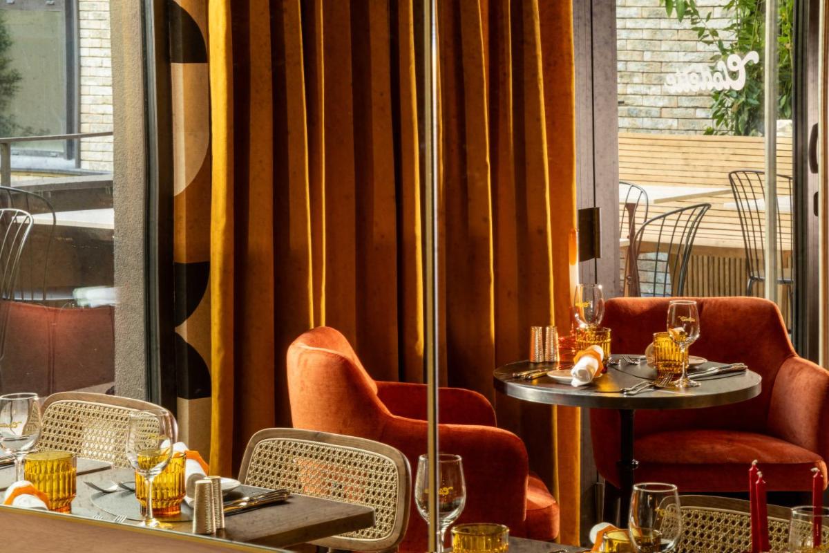 Coin salon dans l'établissement Belinda Hôtel & Spa