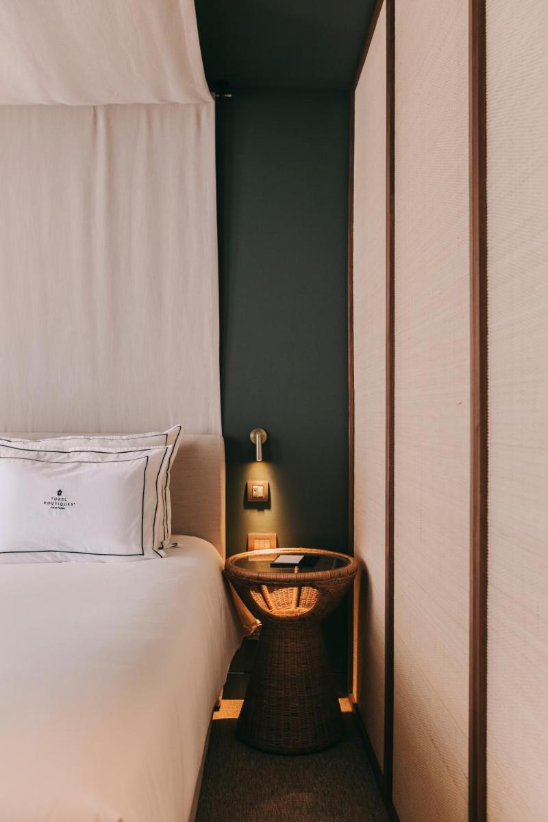 Uma cama ou camas num quarto em Torel Terra Brava
