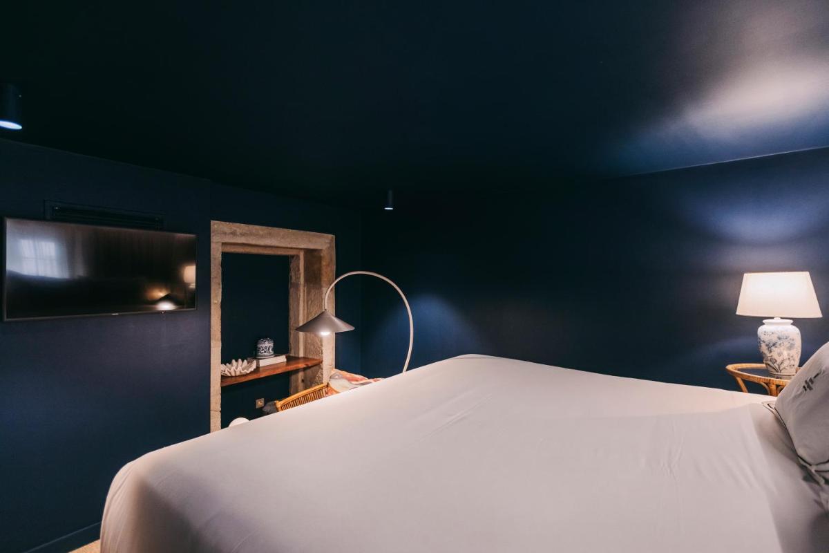 Uma cama ou camas num quarto em Torel Terra Brava