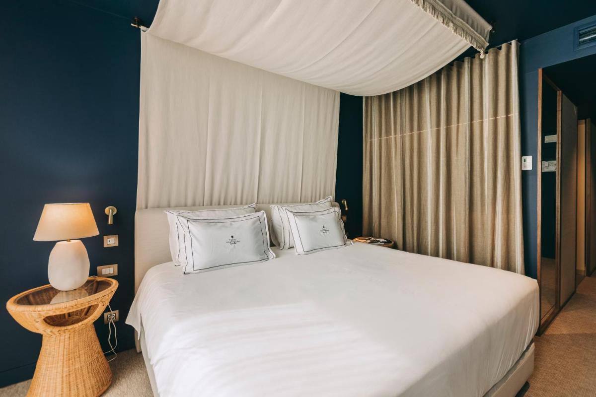 Uma cama ou camas num quarto em Torel Terra Brava