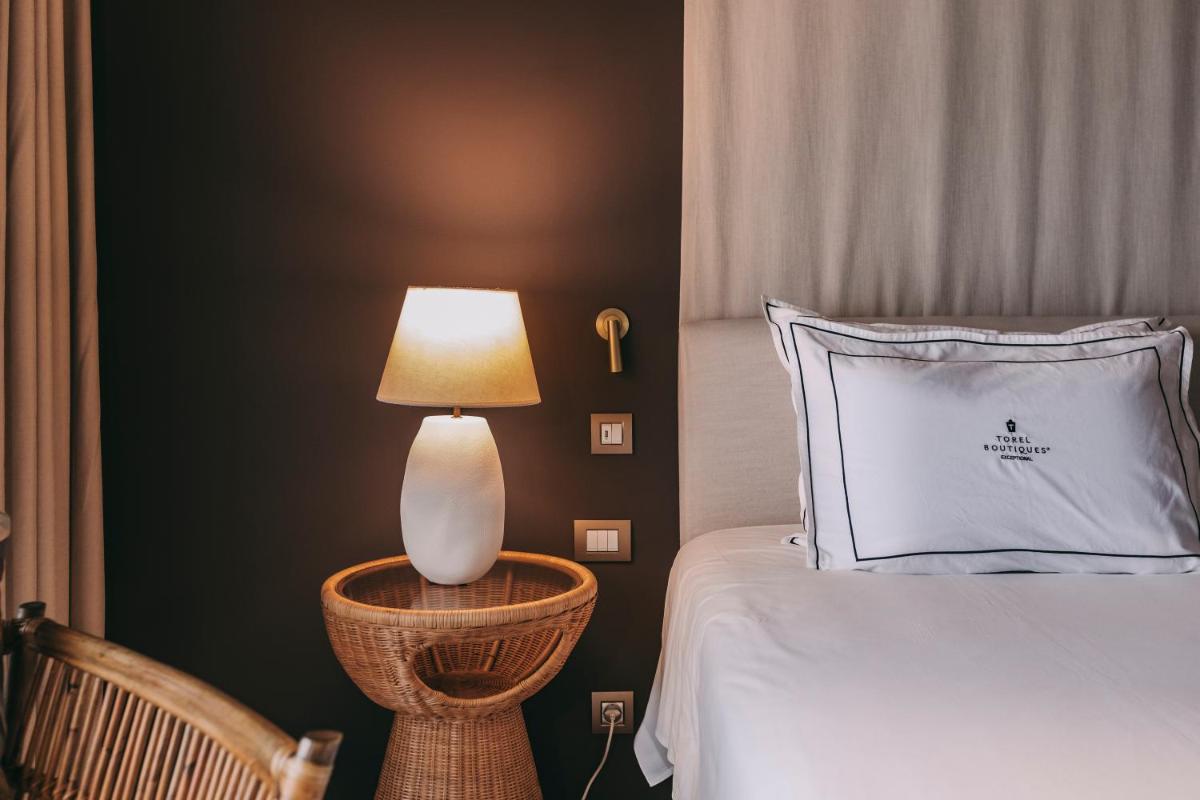 Uma cama ou camas num quarto em Torel Terra Brava