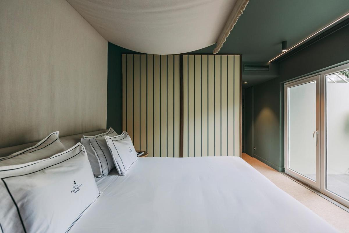 Uma cama ou camas num quarto em Torel Terra Brava