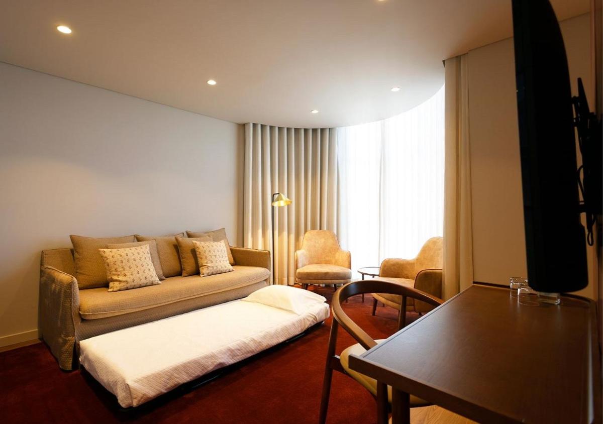 Uma área de estar em Montebelo Viseu Congress Hotel & Spa