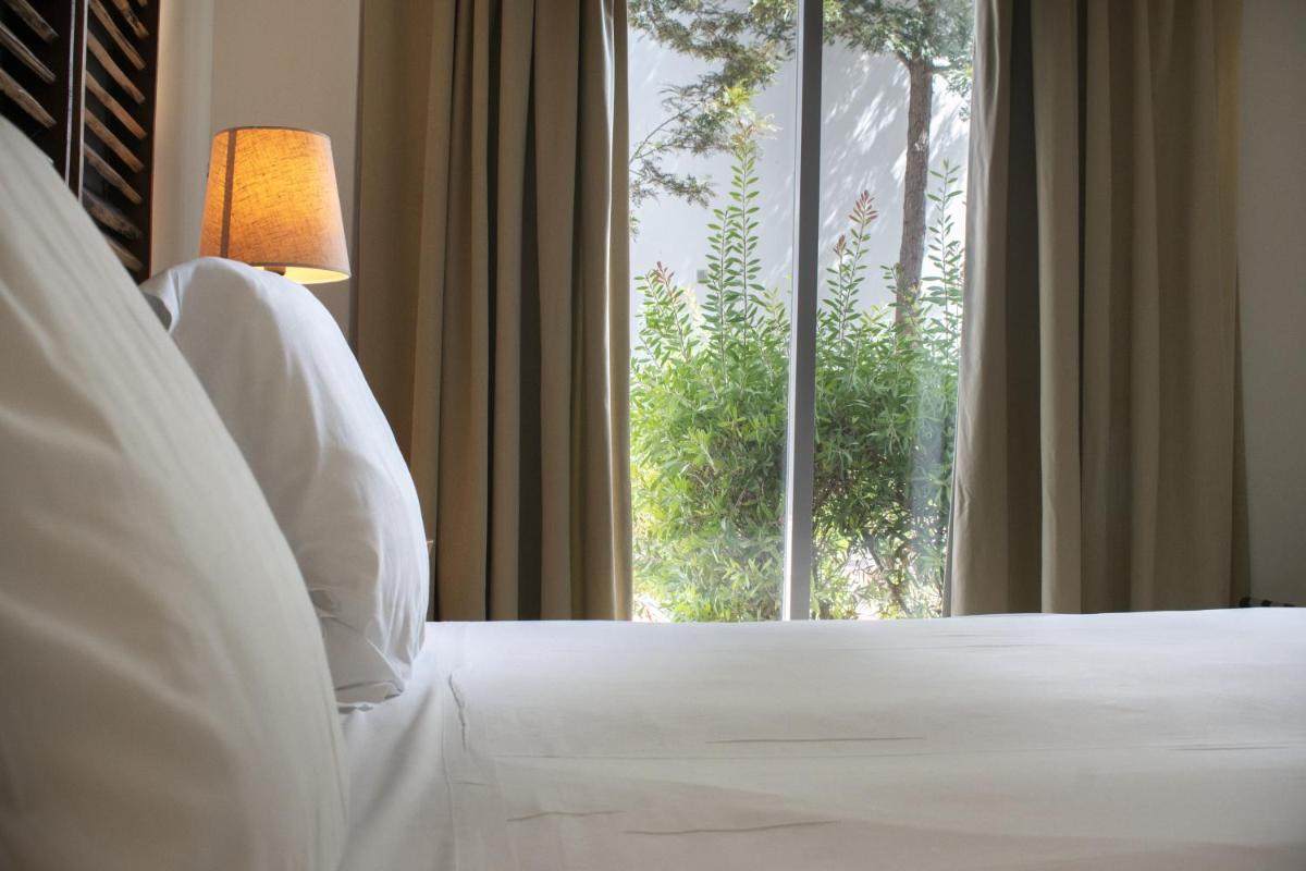Cama o camas de una habitación en Fairplay Golf & Spa Resort