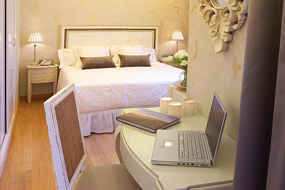 Cama o camas de una habitación en Hotel Sa Calma