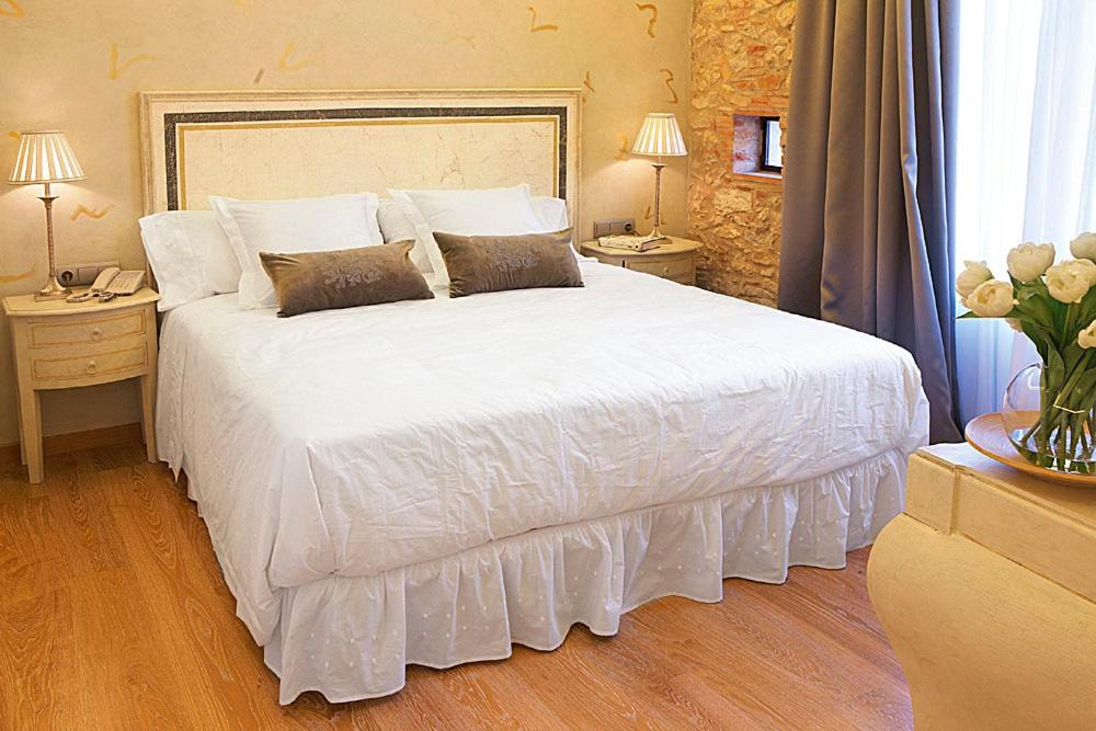 Cama o camas de una habitación en Hotel Sa Calma