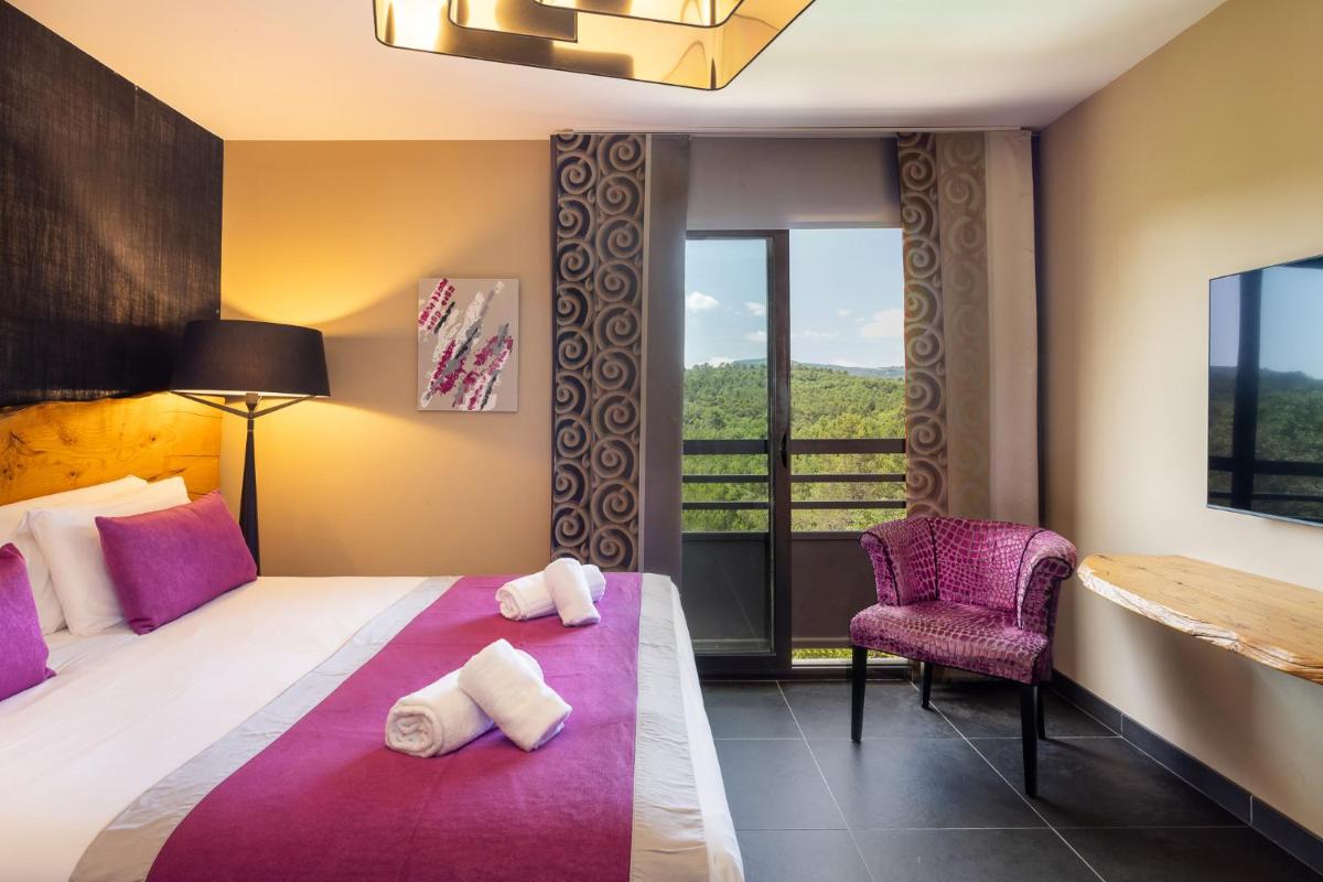 Un ou plusieurs lits dans un hébergement de l'établissement Mercure Brignoles Golf de Barbaroux & Spa