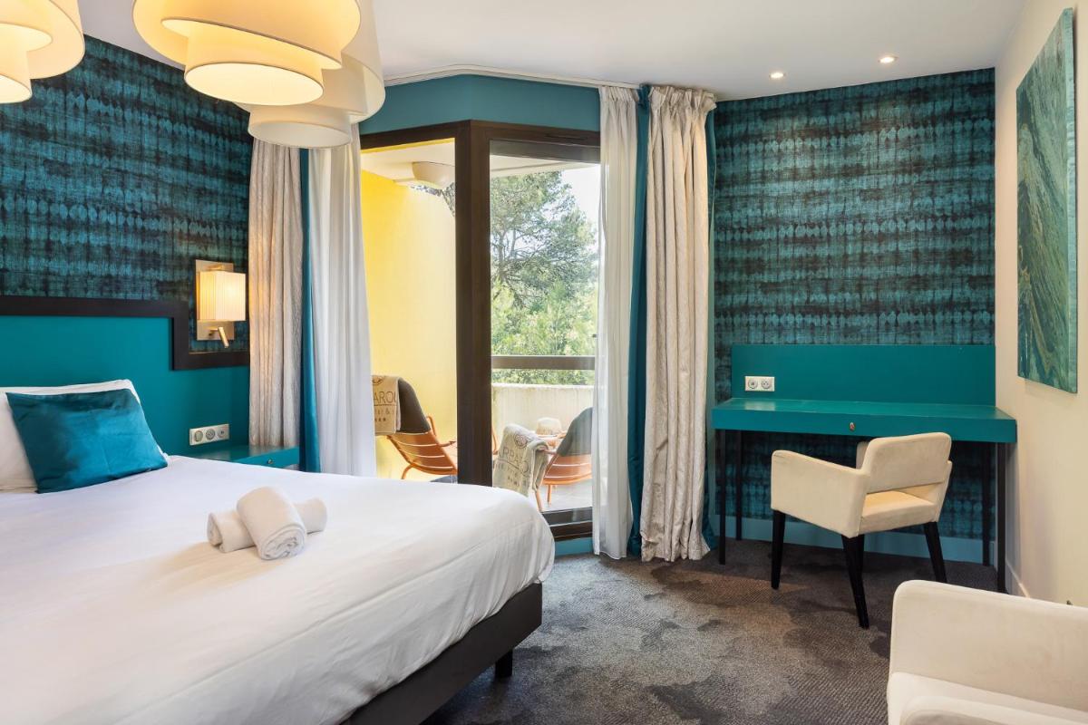 Un ou plusieurs lits dans un hébergement de l'établissement Mercure Brignoles Golf de Barbaroux & Spa