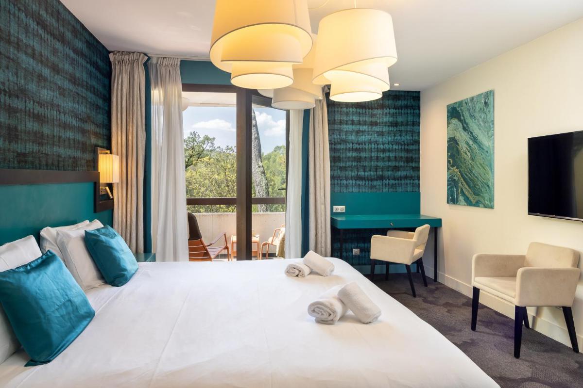 Un ou plusieurs lits dans un hébergement de l'établissement Mercure Brignoles Golf de Barbaroux & Spa