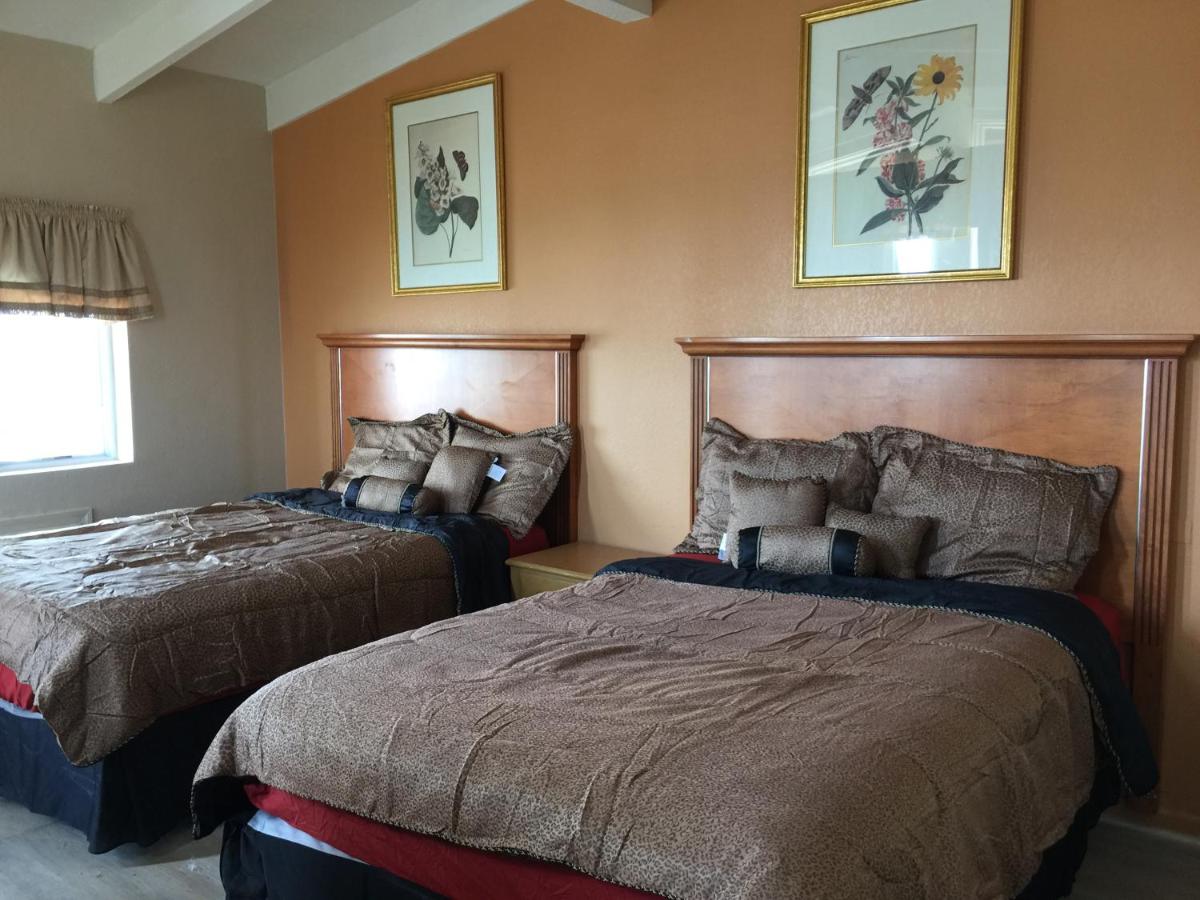 Pelican Inn & Suites - Housity