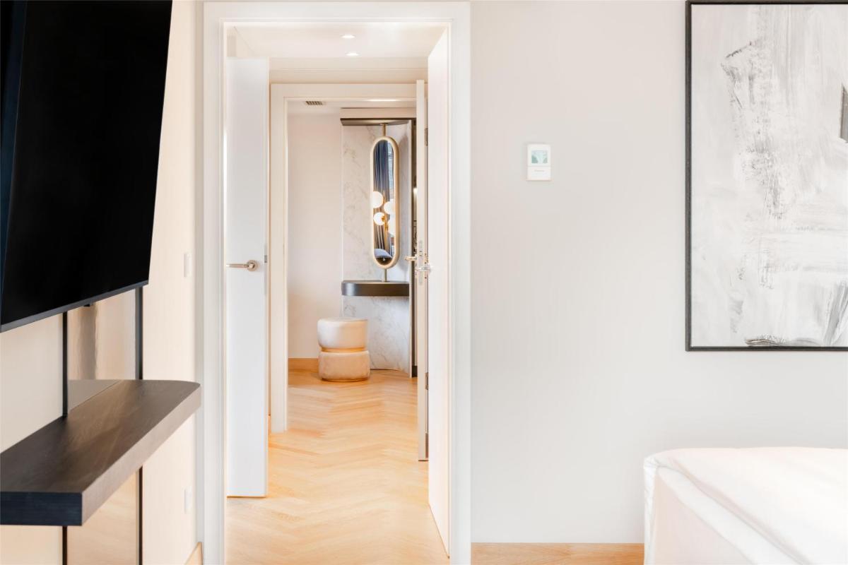 Ein Bett oder Betten in einem Zimmer der Unterkunft Hilton Berlin