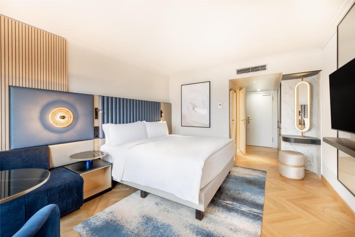 Ein Bett oder Betten in einem Zimmer der Unterkunft Hilton Berlin