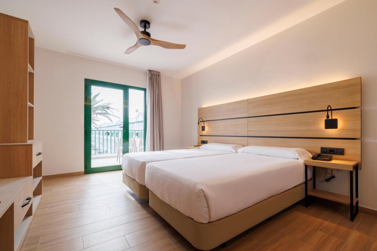 Cama o camas de una habitación en MYND Yaiza