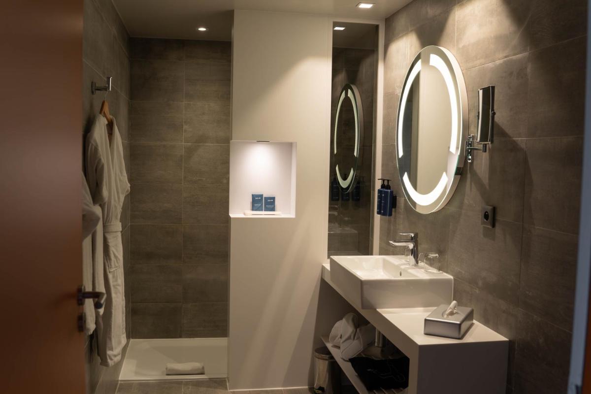 Salle de bains dans l'établissement Radisson Blu Hotel Bordeaux