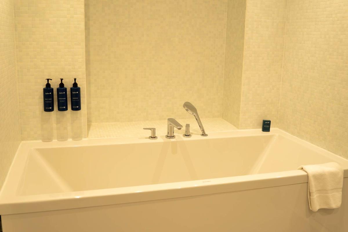 Salle de bains dans l'établissement Radisson Blu Hotel Bordeaux