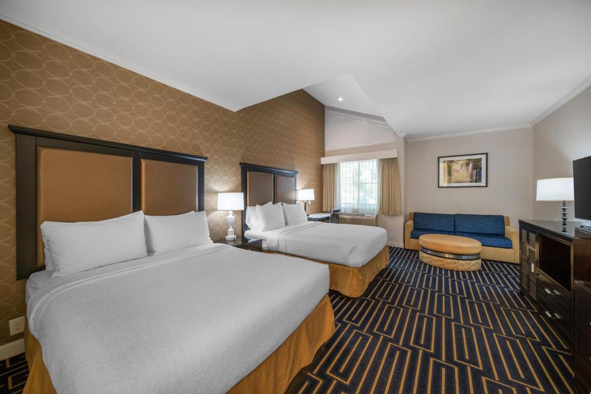Best Western Plus Palm Court Hotel - Housity