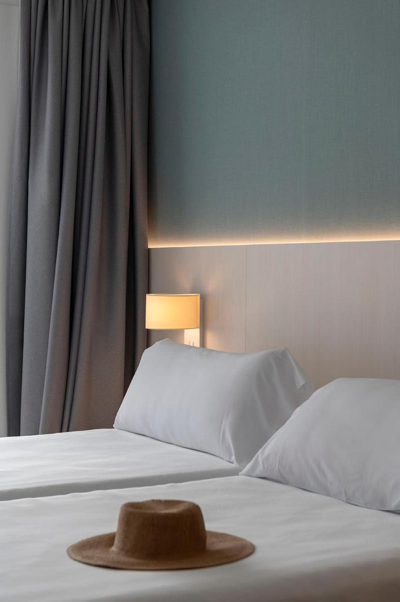 Cama o camas de una habitación en Aparthotel Costa Encantada