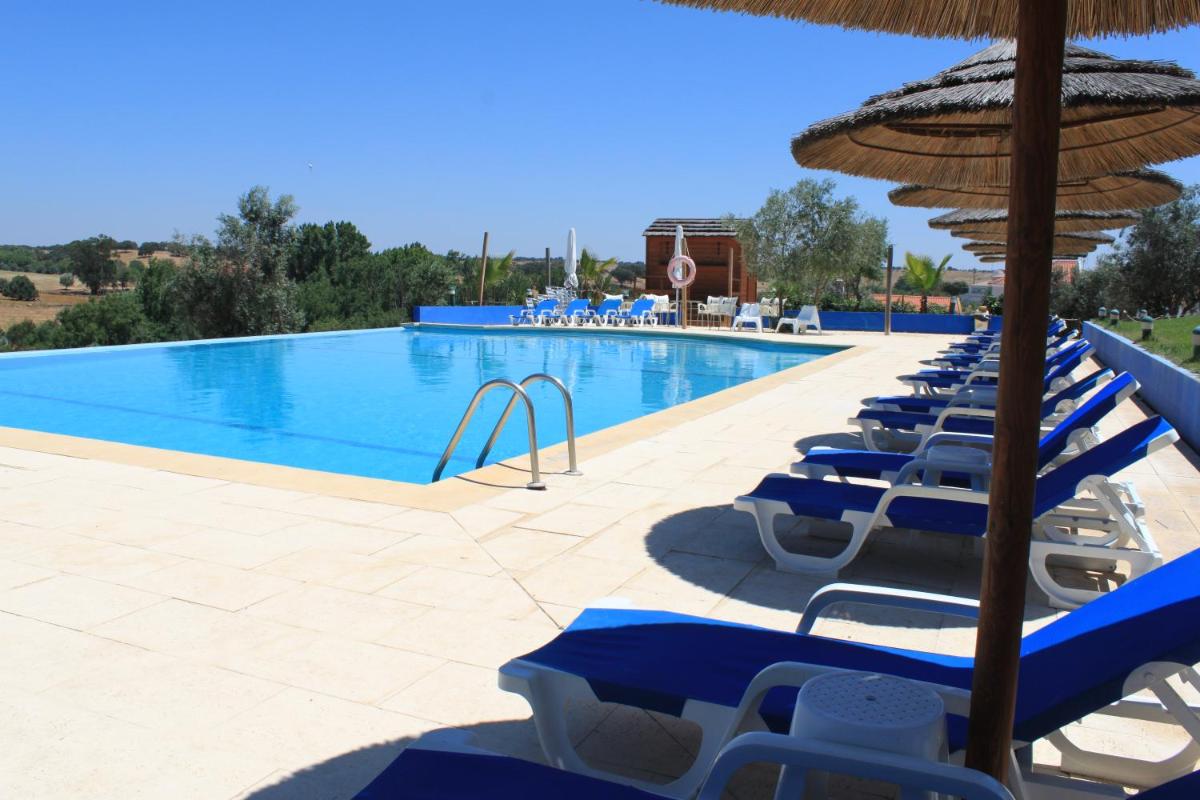 A piscina em ou perto de Hotel O Gato & Spa