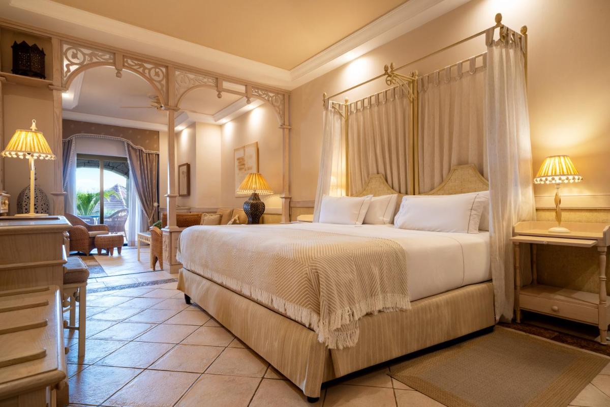 Cama o camas de una habitación en JOIA El Mirador by Iberostar -Adults Only