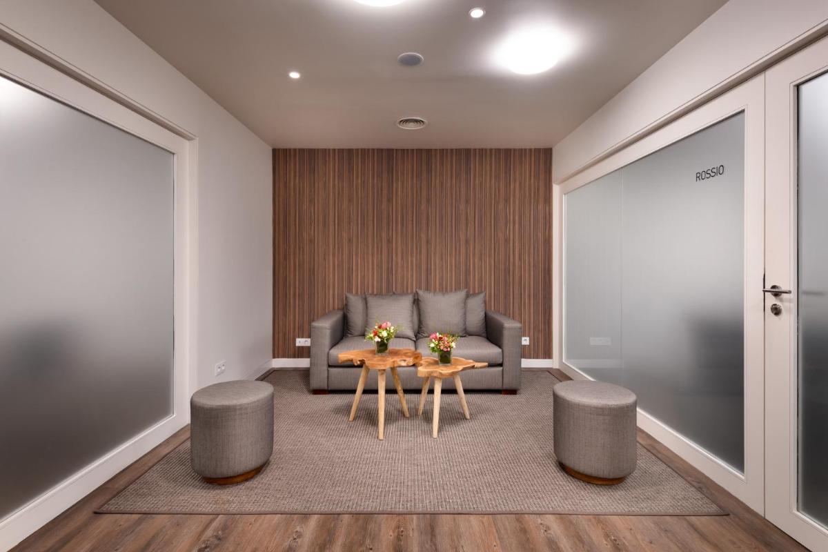 Uma área de estar em Inspira Liberdade Boutique Hotel