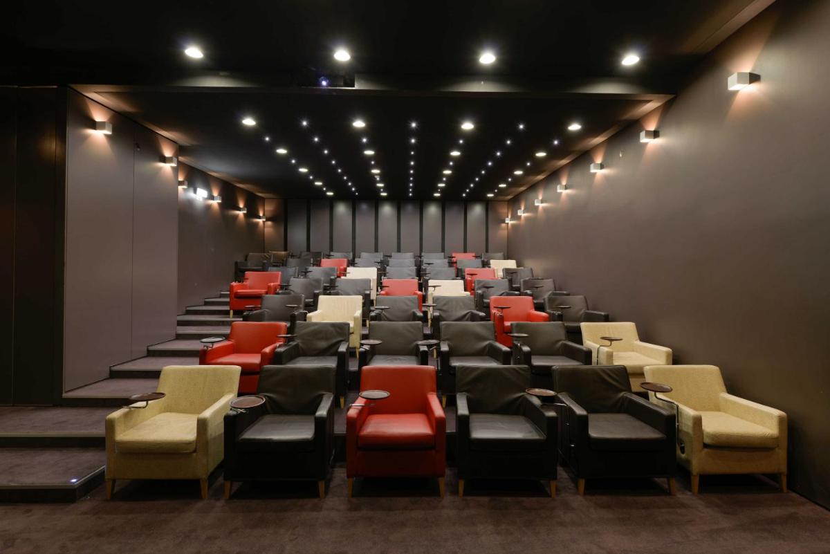 Uma área de estar em Inspira Liberdade Boutique Hotel