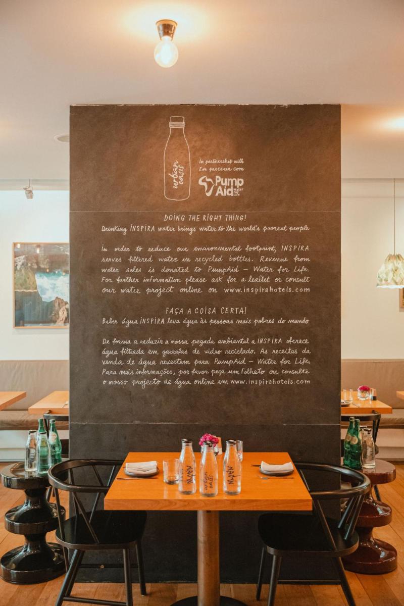 Um restaurante ou outro lugar para comer em Inspira Liberdade Boutique Hotel