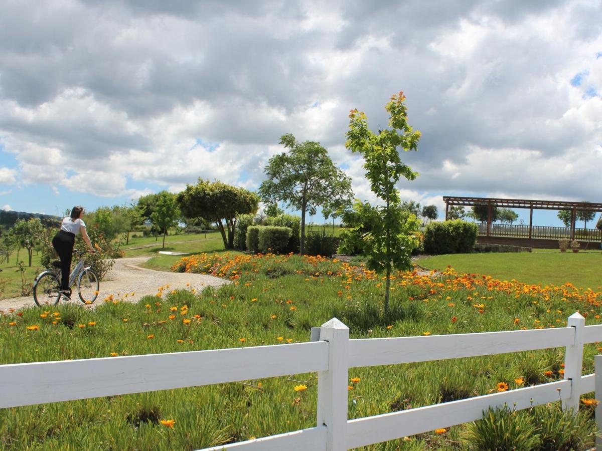 Um jardim no exterior de Real Abadia, Congress & Spa Hotel