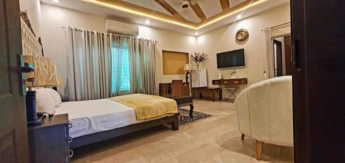 Hotel Luxe Heights Lahore - Housity