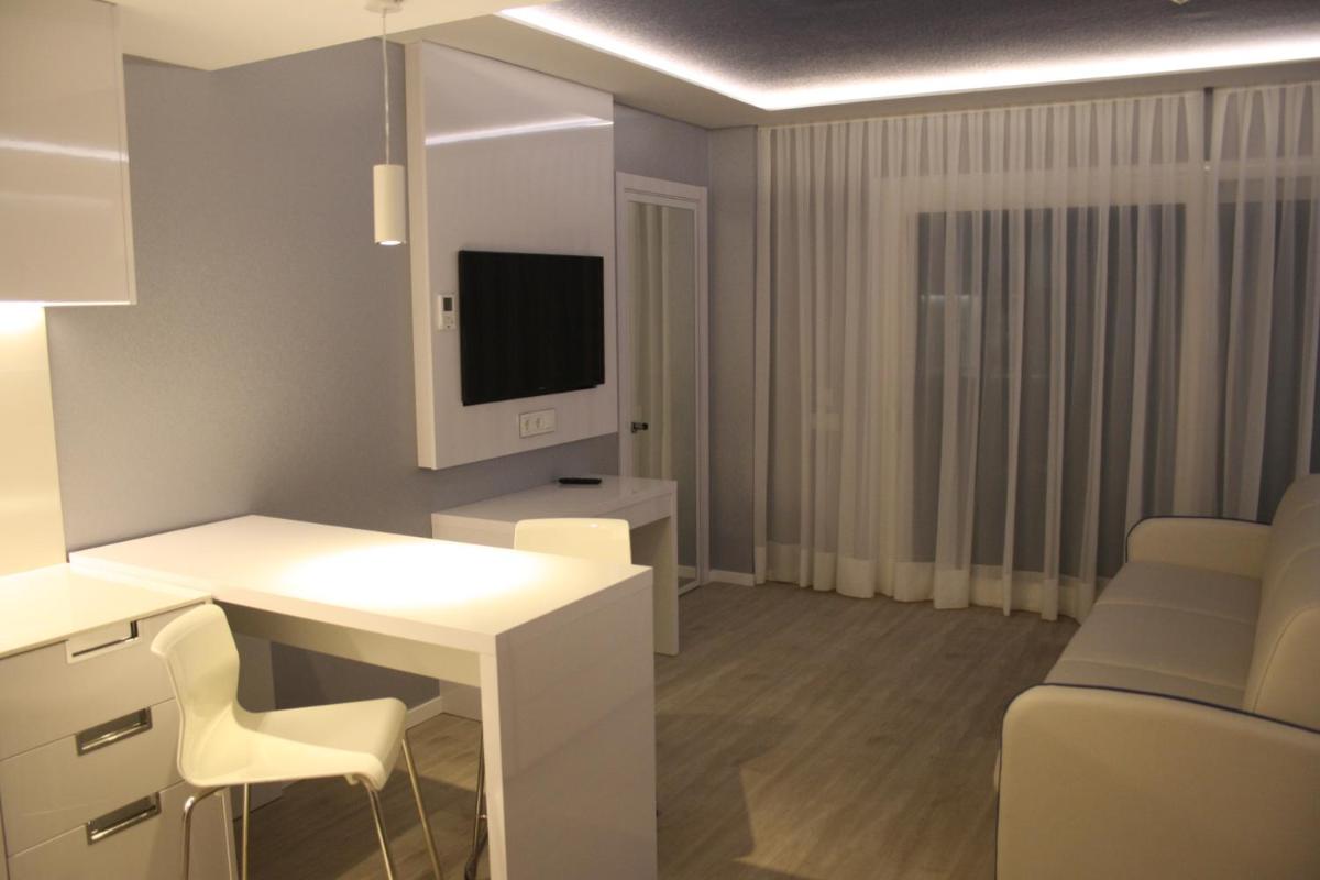 Una televisión o centro de entretenimiento en Masd Mediterraneo Hotel Apartamentos Spa