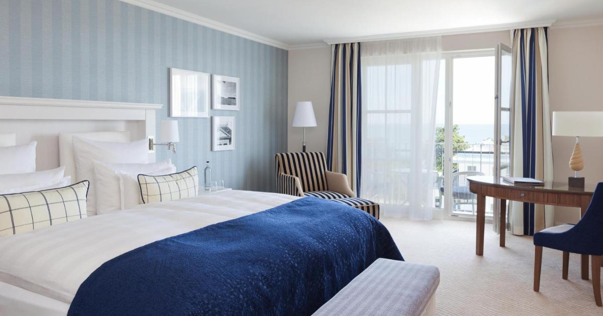 Ein Bett oder Betten in einem Zimmer der Unterkunft Steigenberger Grandhotel & Spa Heringsdorf