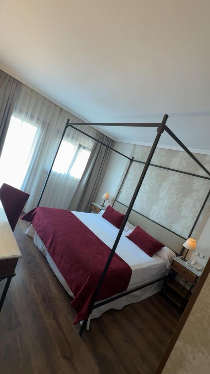Cama o camas de una habitación en Hotel Rural Spa & Wellness Hacienda Los Robles