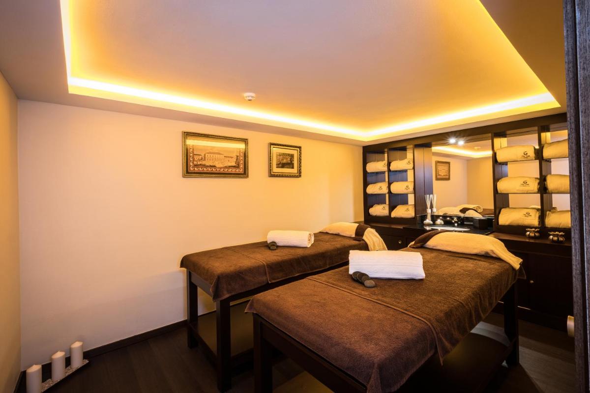 Uma cama ou camas num quarto em Vila Galé Estoril