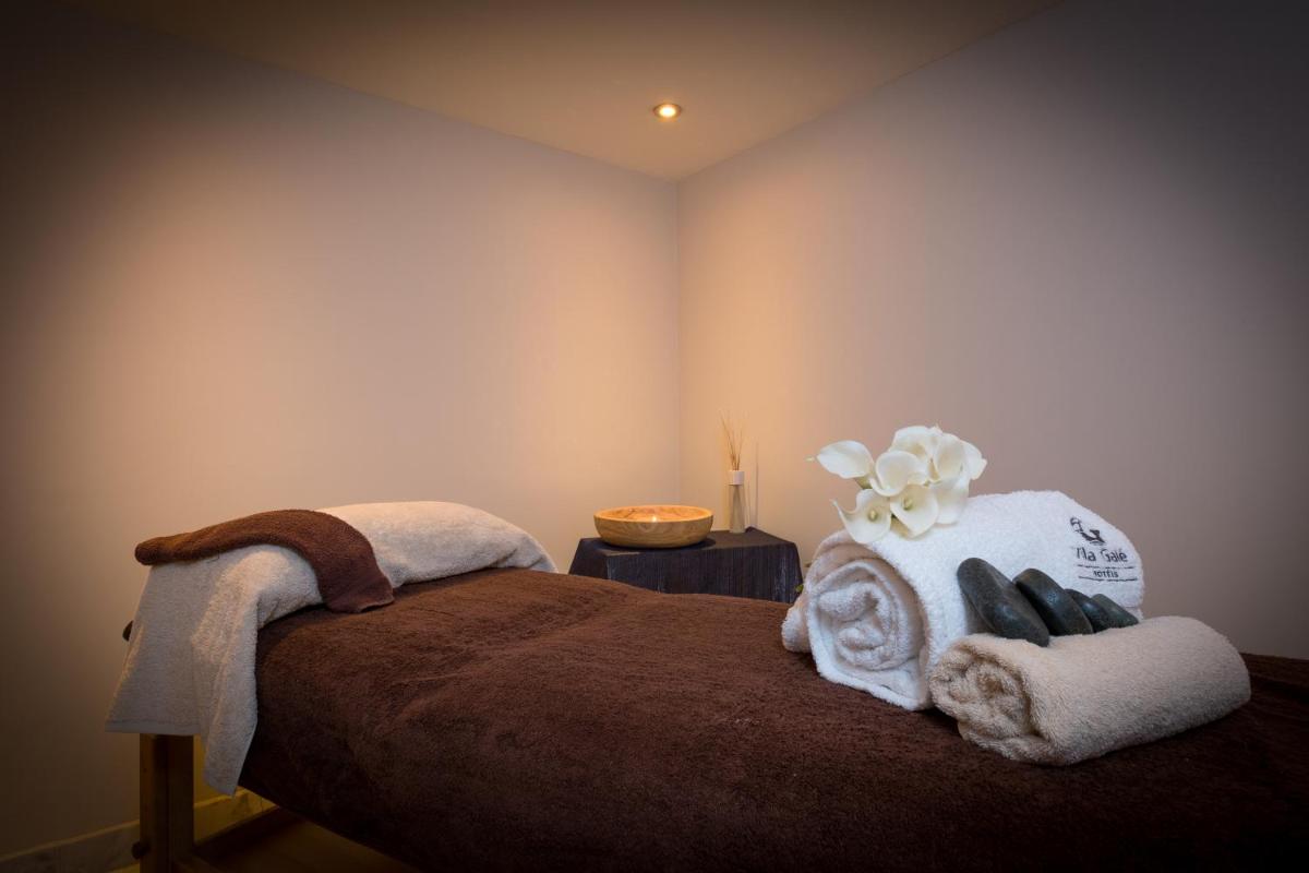 Uma cama ou camas num quarto em Vila Galé Estoril
