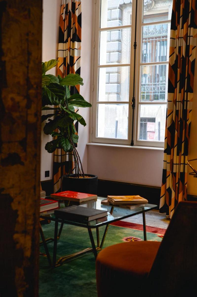 Coin salon dans l'établissement Hôtel Saint-Marc