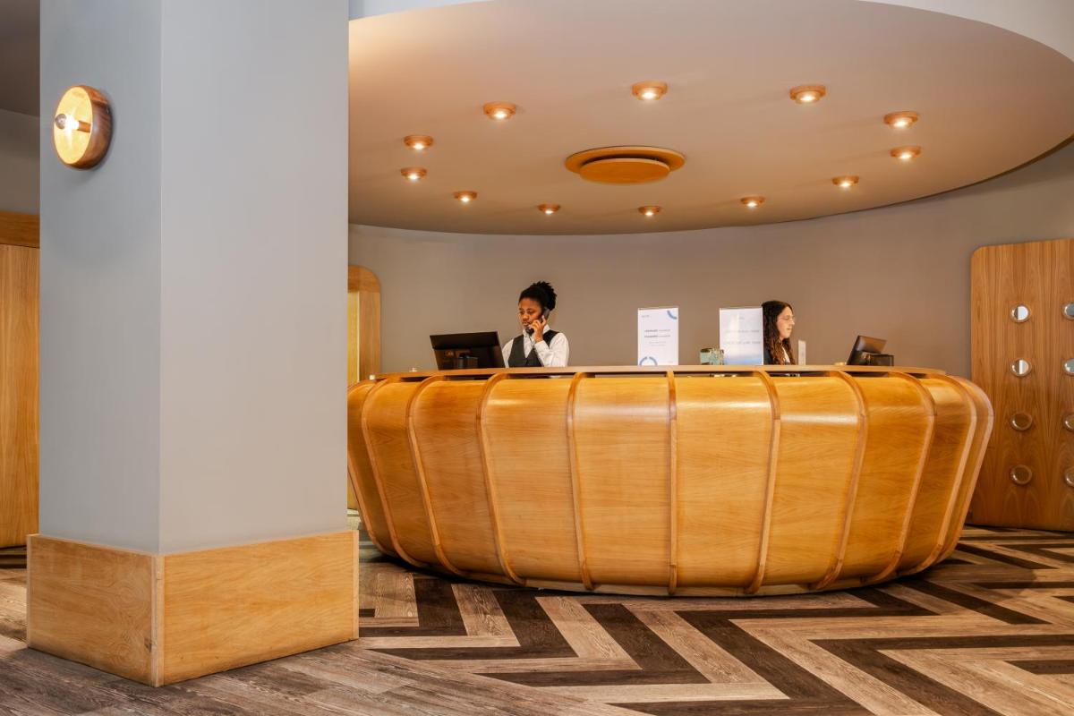 Os clientes hospedados em Axis Vermar Conference & Beach Hotel