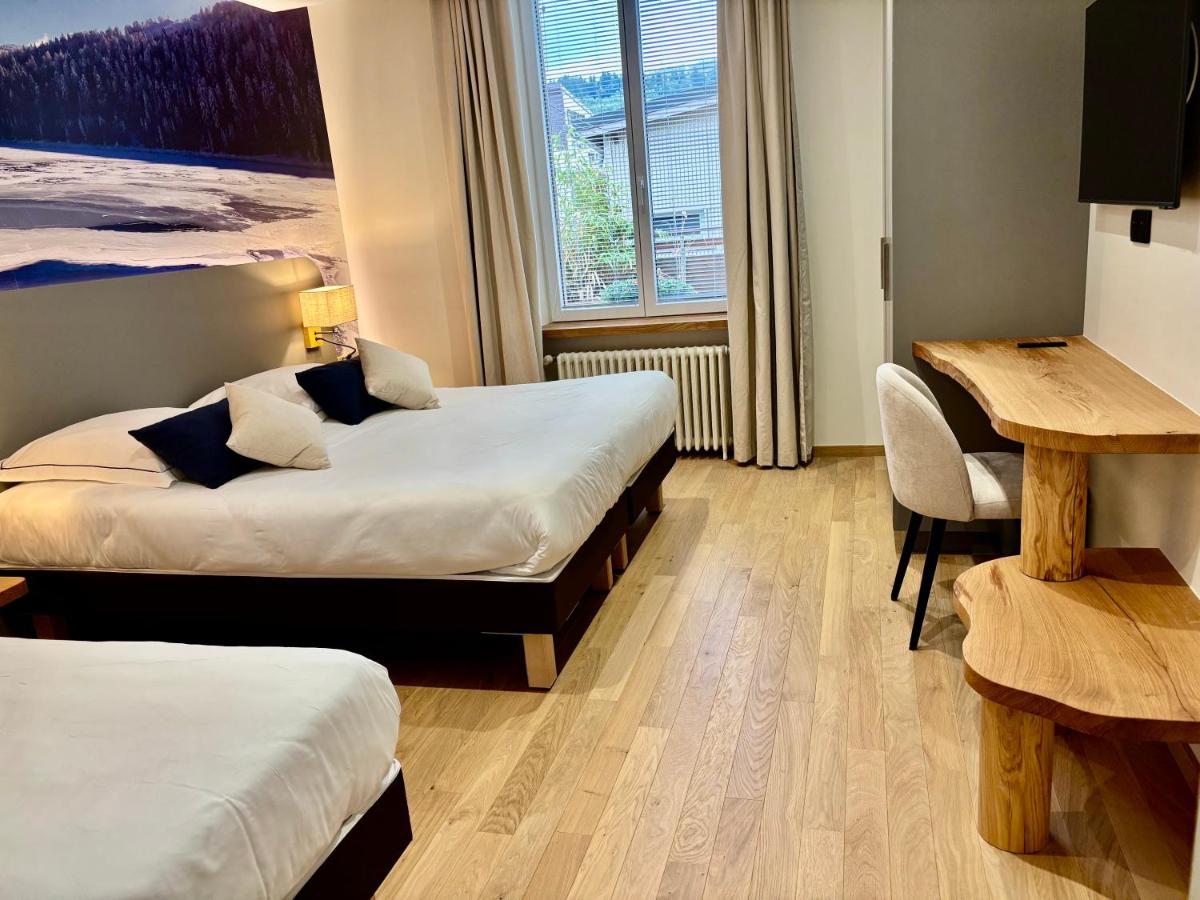 Un ou plusieurs lits dans un hébergement de l'établissement Hotel de la Jamagne & Spa