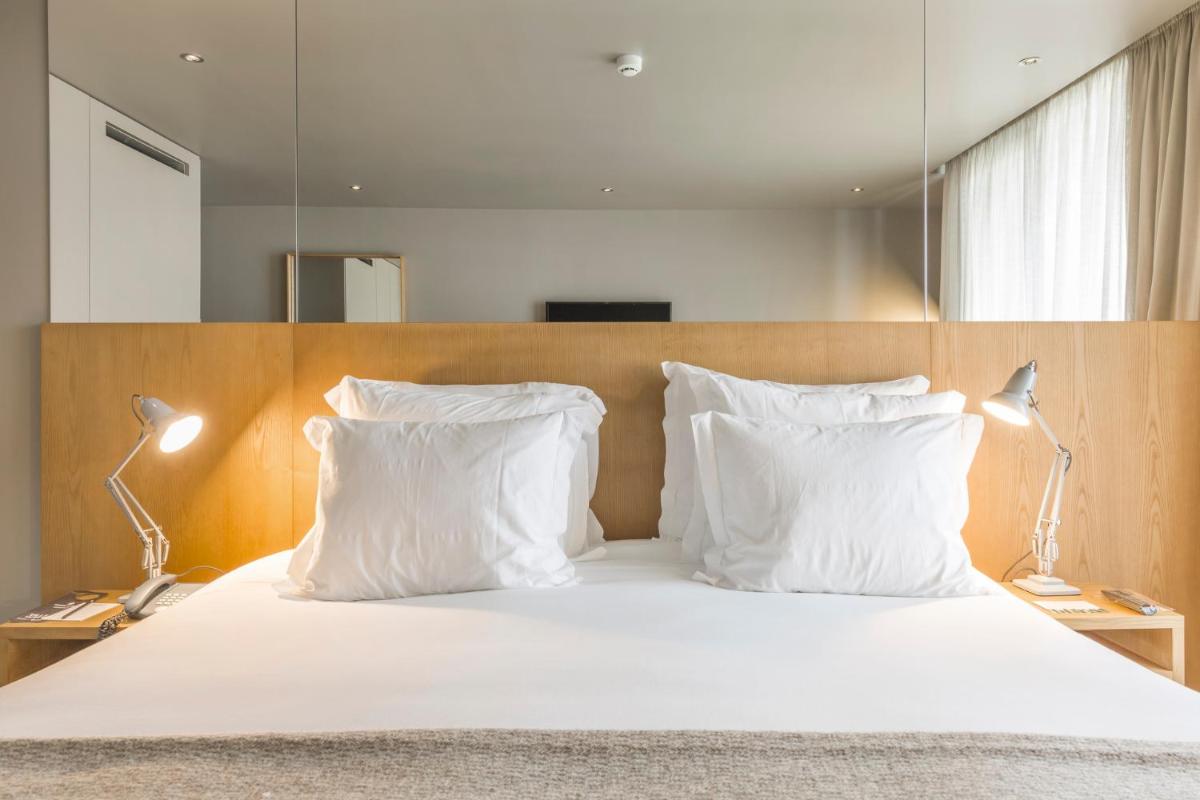 Uma cama ou camas num quarto em Villa C Boutique Hotel