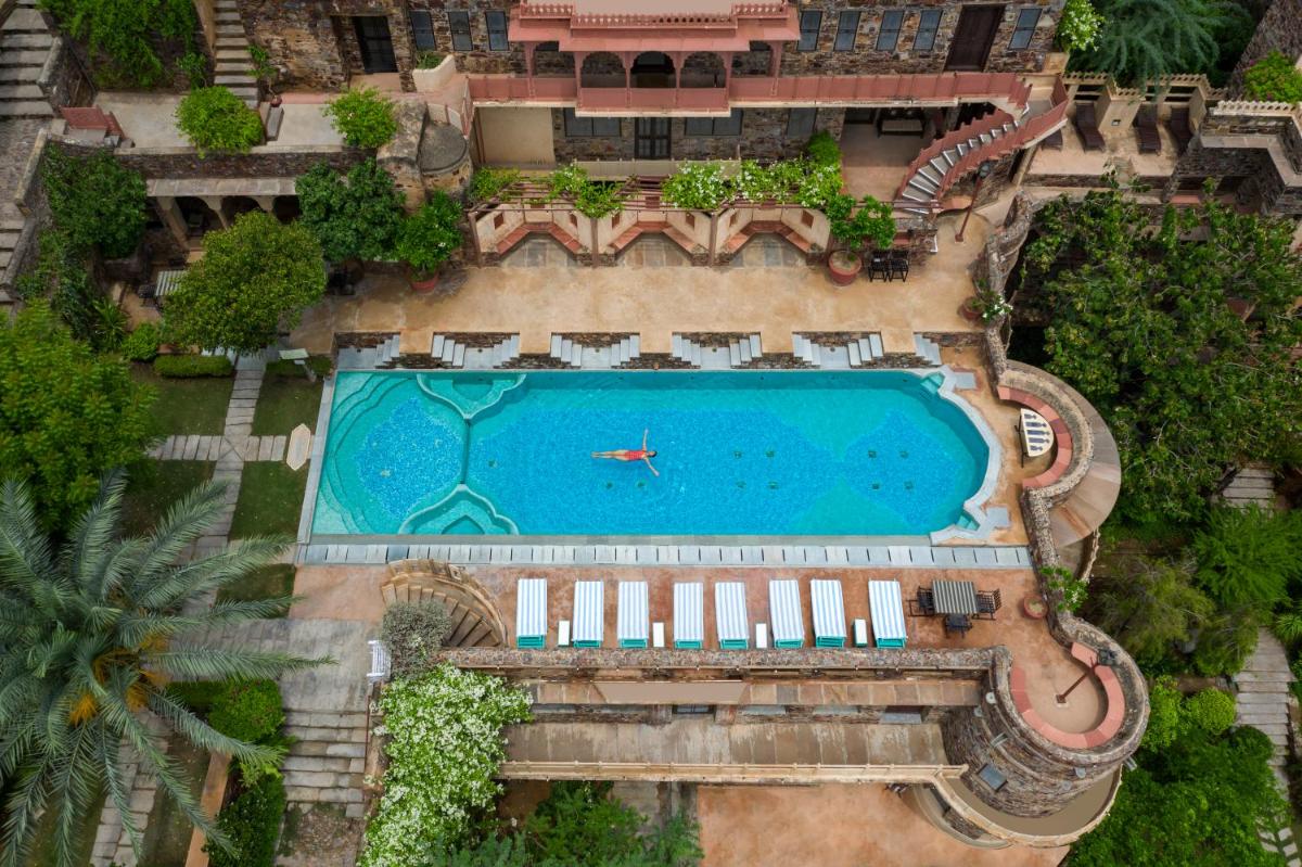 an overhead view of a swimming pool in a resort at Neemrana Fort-Palace in Neemrana