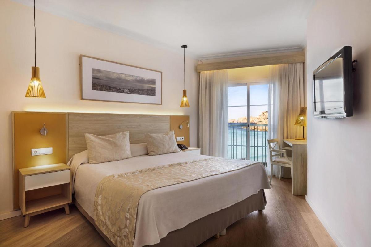Cama o camas de una habitación en VIVA Cala Mesquida Resort & Spa