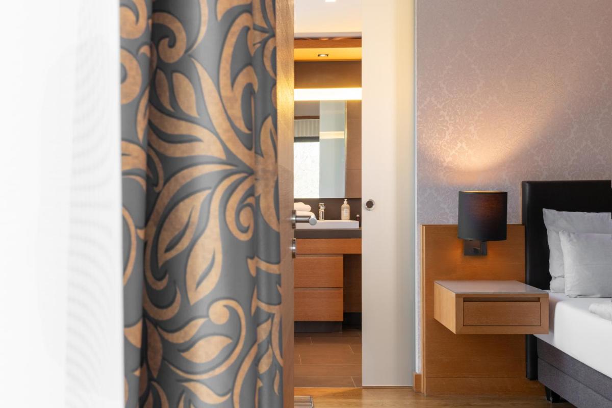 Ein Bett oder Betten in einem Zimmer der Unterkunft Schlossgut Gross Schwansee
