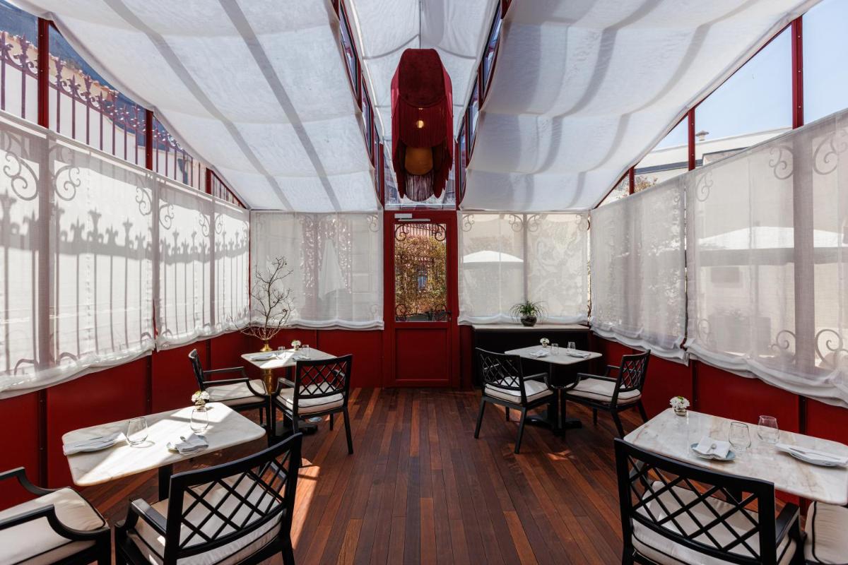 Um restaurante ou outro lugar para comer em MS Collection Aveiro - Palacete Valdemouro